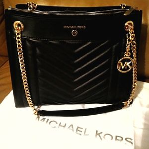 Black leather Michael Kors purse